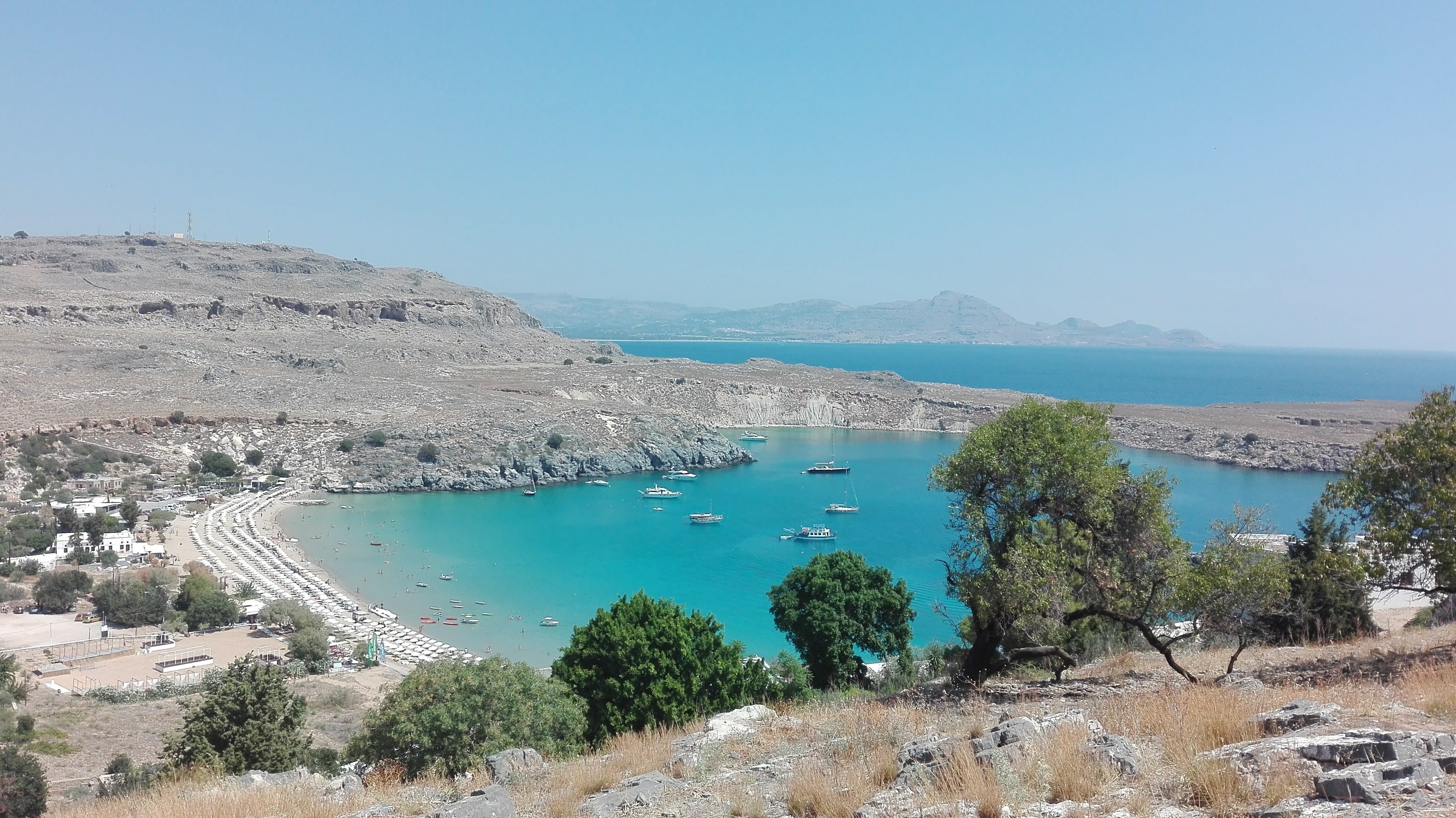 Walking up to the Acropolis of Lindos, with a wonderful view on one of the beaches