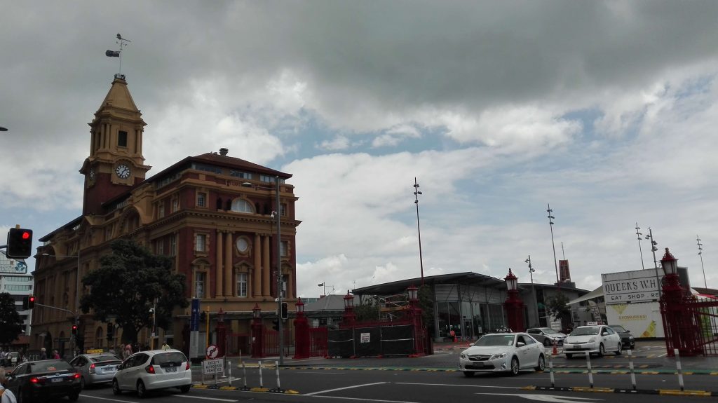 Auckland port old building and famous red gates of the port